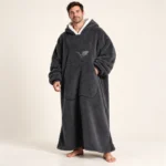 LongLounge extra long blanket hoodie in black — full length front view