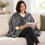 Grey Zip heated fleece cape – Reading on the sofa